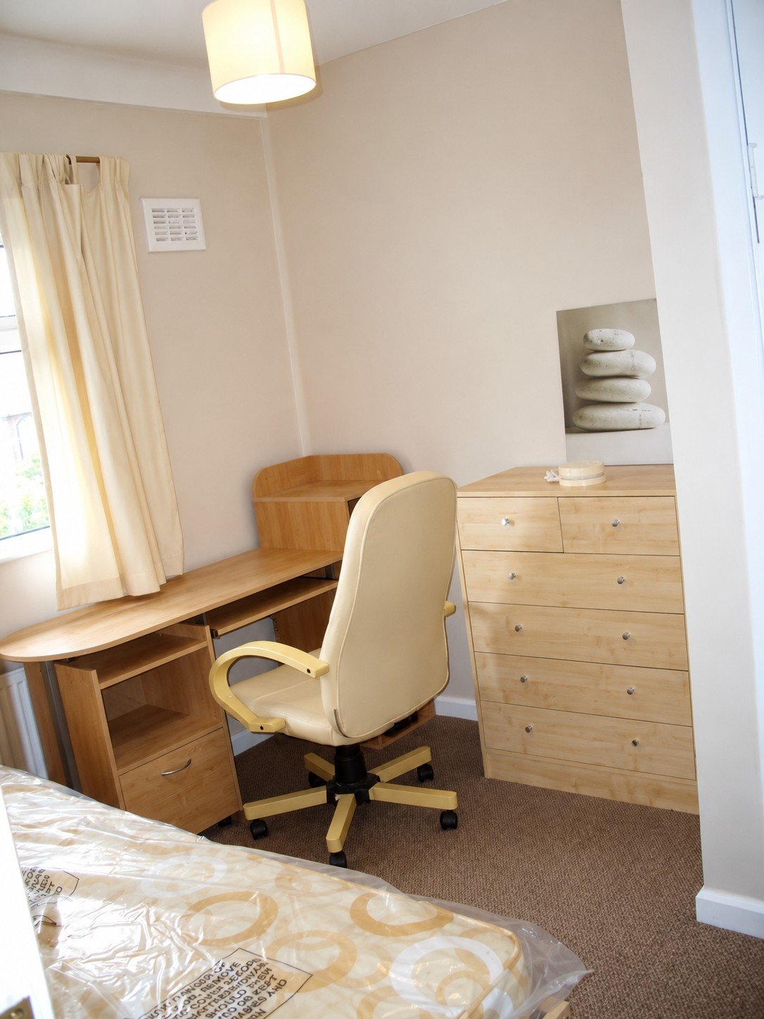 First-floor single room with desk and storage